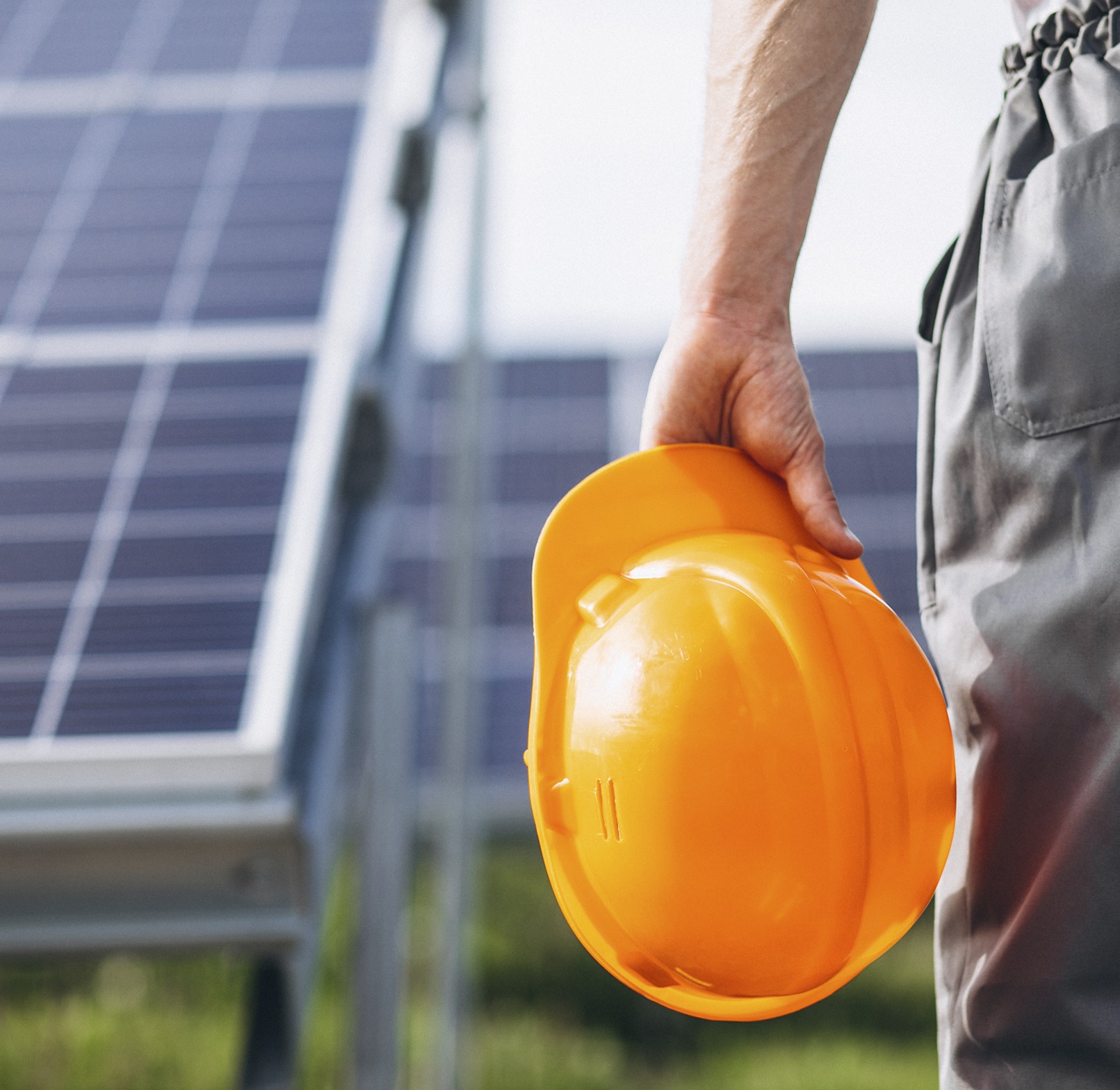 Energy saving concept with a light bulb and solar panels