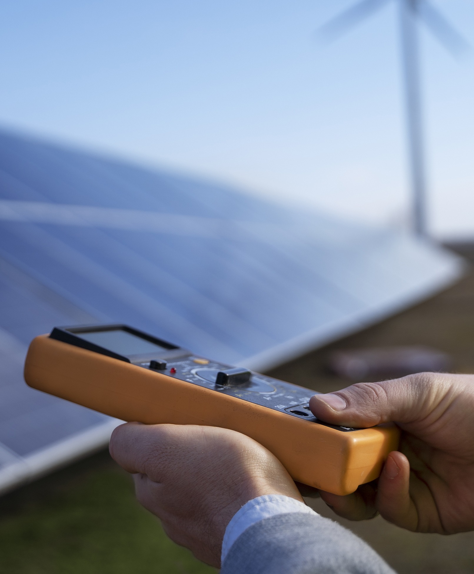 Energy saving concept with a light bulb and solar panels